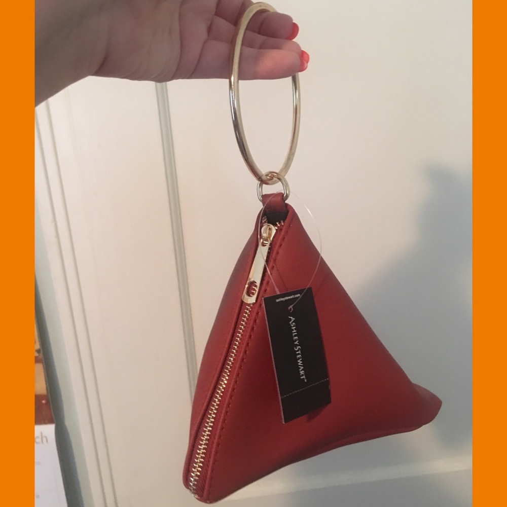 Rust-colored pyramid purse with wrist hoop